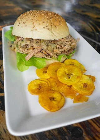 PAN CON LECHON's foto | Café Crystal |  BizneCubano