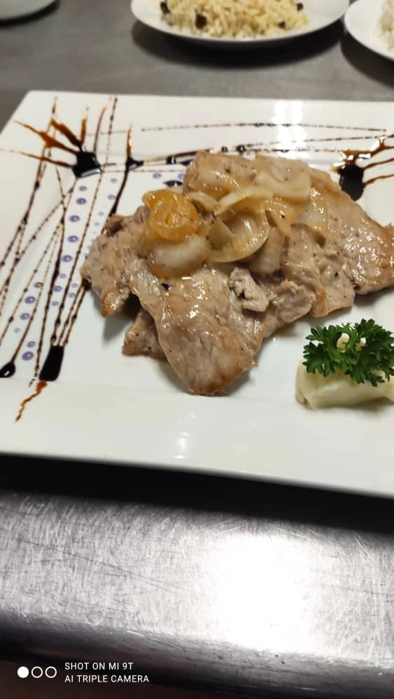 Bistec de cerdo Grillet's foto | Café Crystal |  BizneCubano